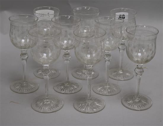 A set of nine etched drinking glasses